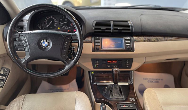 
								BMW X5 lleno									